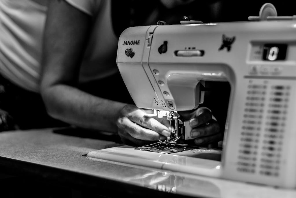 Person Sewing machine