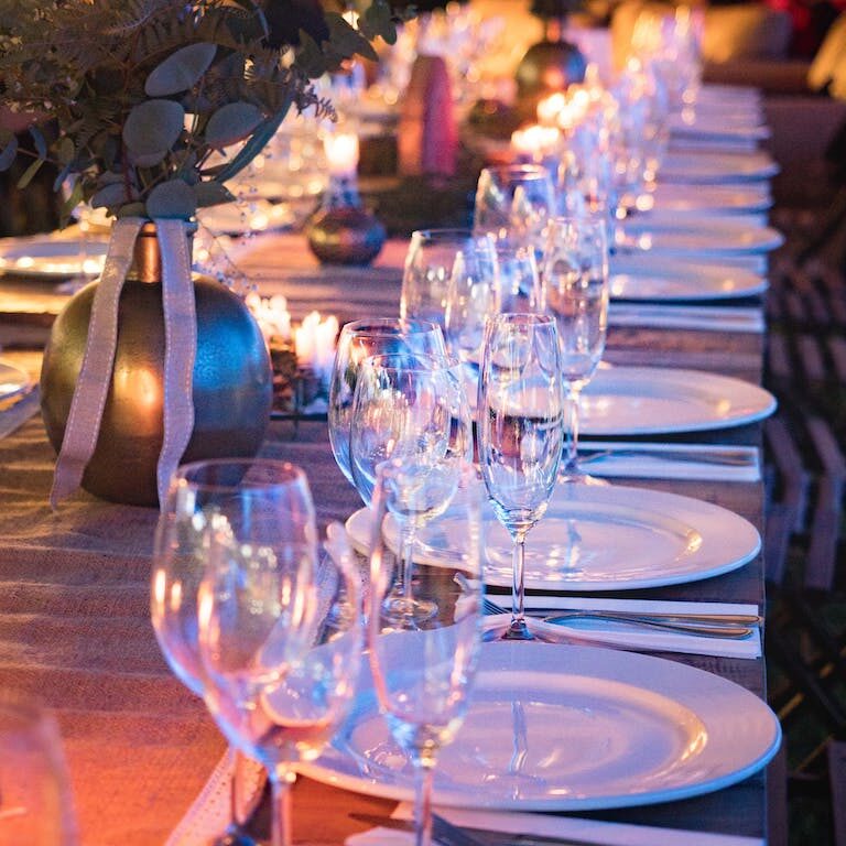 Plates and Wine Glass on Table parties dinner intimate